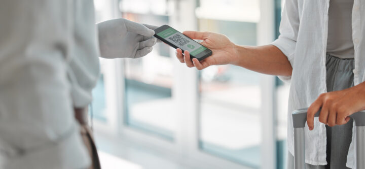 Covid QR code, travel passport and vaccine medical status with immigration, traveling and safety at.
